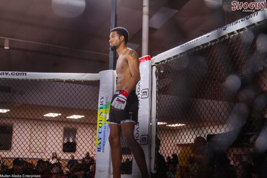 Deon Jackson, kids Muay Thai instructor at Baltimore Martial Arts Academy, in the cage at Shogun Fights