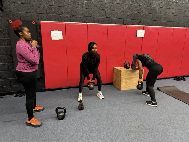 Kettlebell deadlift drill in a kettlebell fitness class at Baltimore Martial Arts Academy