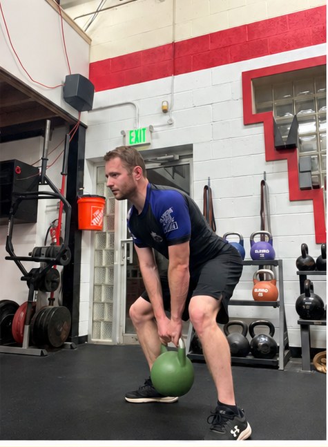 Mitchell Peter, certified personal trainer and kettlebell instructor at Baltimore Martial Arts Academy